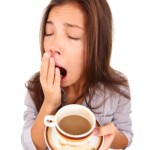 Tired woman yawning