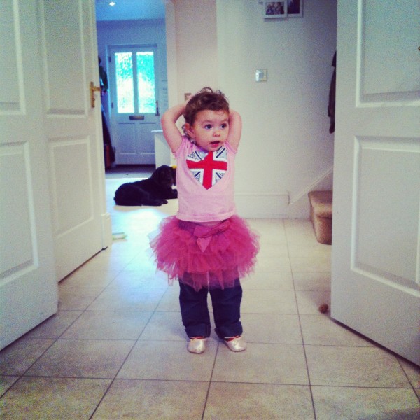 Little Girl Dancing In Her First Ballet shoes